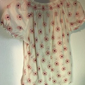 white patterned blouse